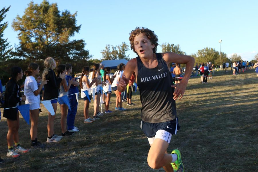 Closing in on the finish line, freshman Jordan Schierbaum prepares to finish his race.