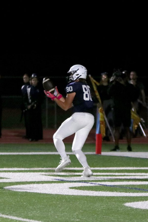 Sophomore Brody Brigham catches a pass to secure a touchdown.
