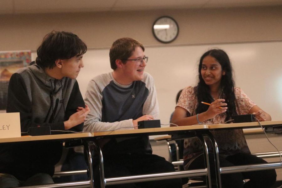 Freshman Rachel Joseph, Ian Weatherman and senior Jackson Wilhoit collaborate on a question.