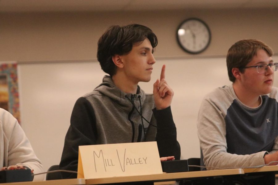During the semi finals, senior Jackson Wilhoit raises his hand.