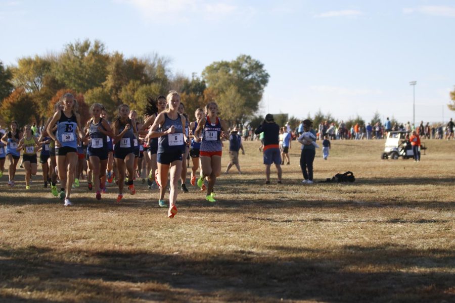 Leading the rest of the runners, sophomore Charlotte Caldwell starts the race in first place.
