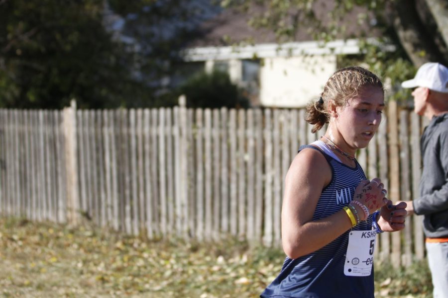 Determined, junior Sarah Anderson runs strongly. 


