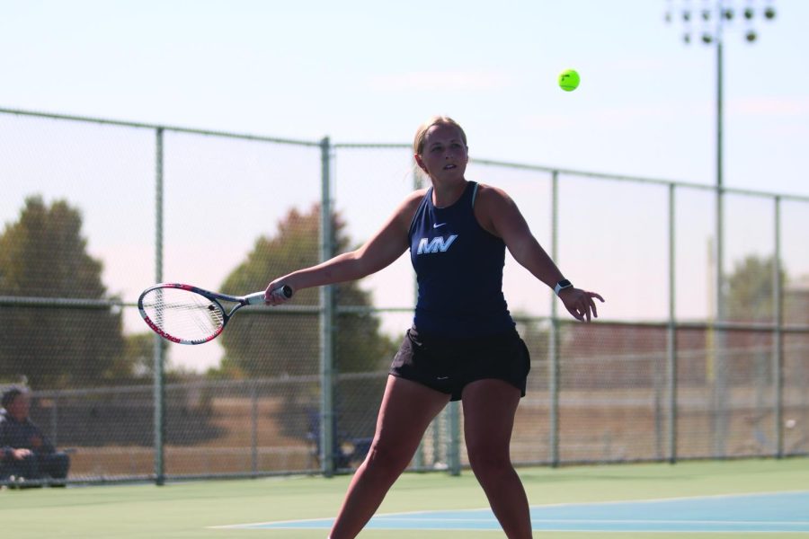 Ready to strike, senior Avery Blubaugh prepares to swing for the ball. 