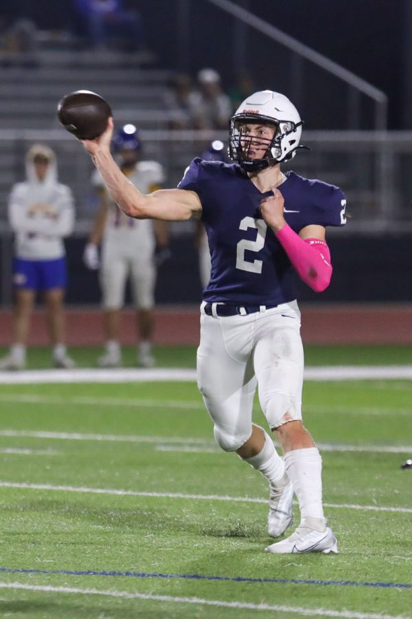 Ready to make the play, senior Hayden Jay aims and begins to throw the ball down field.
