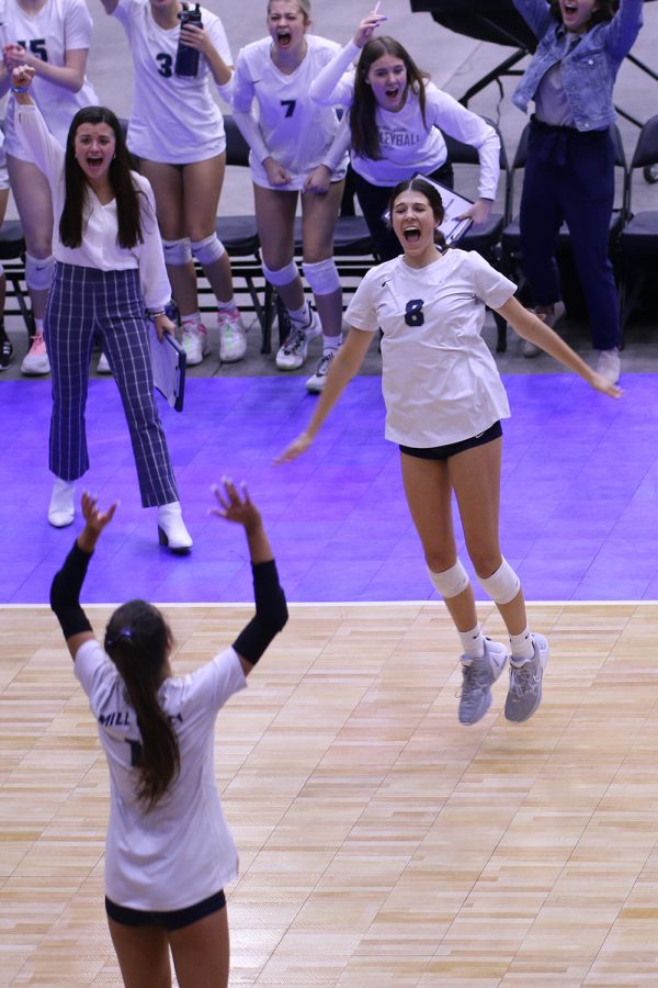 Sophomore middle hitter Ashlyn Blazer celebrates after a kill in the state match against Lawrence Free State.