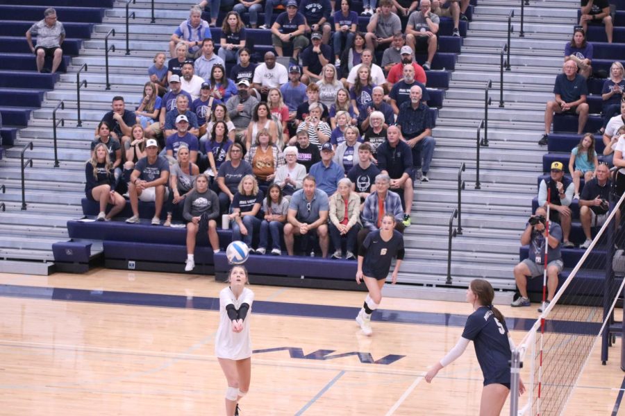 Focusing on the ball, senior Sidney Kacsir passes  the ball for her teammates to set. 