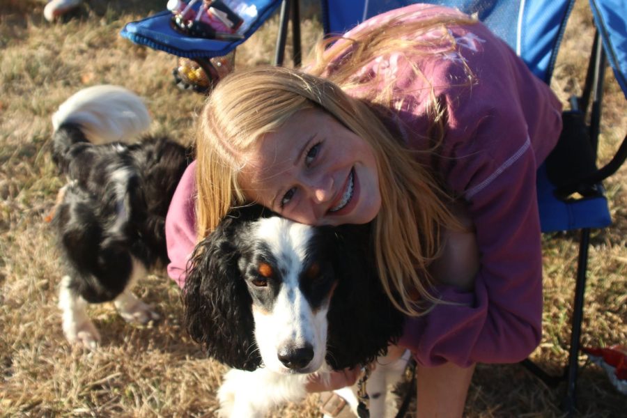 Sophomore Calista Marx poses for a picture with her dog Maui.