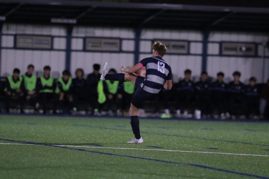 Senior Owen Peachee plays the ball upfield in hopes for a teammate to  attempt a goal Thursday Oct. 25.