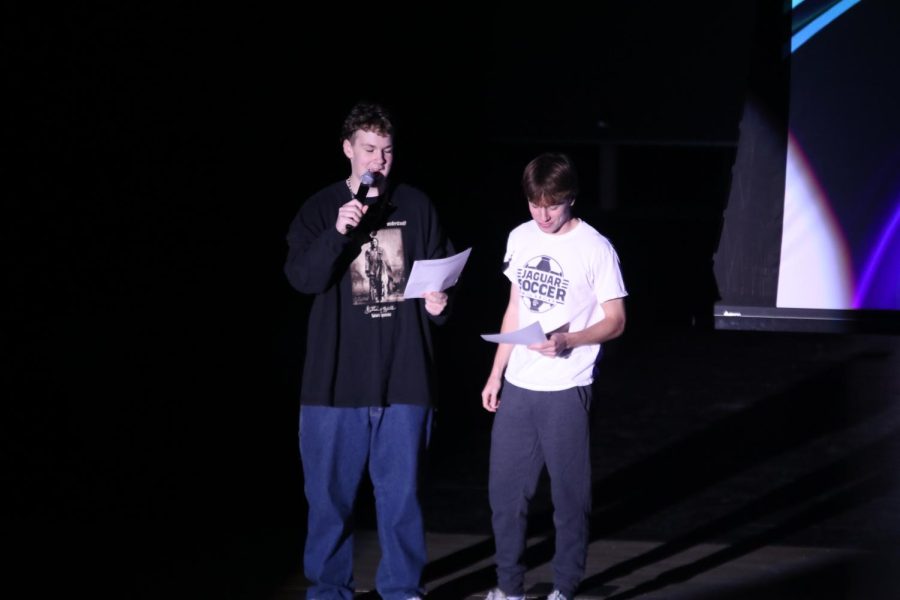 Standing at center stage, junior Nate Garner and senior Toby Kornis introduce the next film. Garner and Kornis emceed this years film festival in addition to having their own films shown.