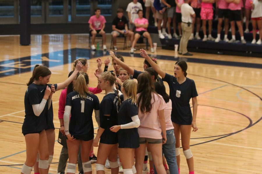 After a time out, head coach Kylie Corneliusen breaks down the team. 