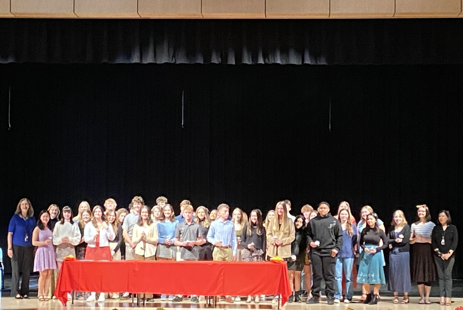 At the conclusion of the induction ceremony, SNHS members gather for a group photo after closing remarks Wednesday, Oct. 9. 