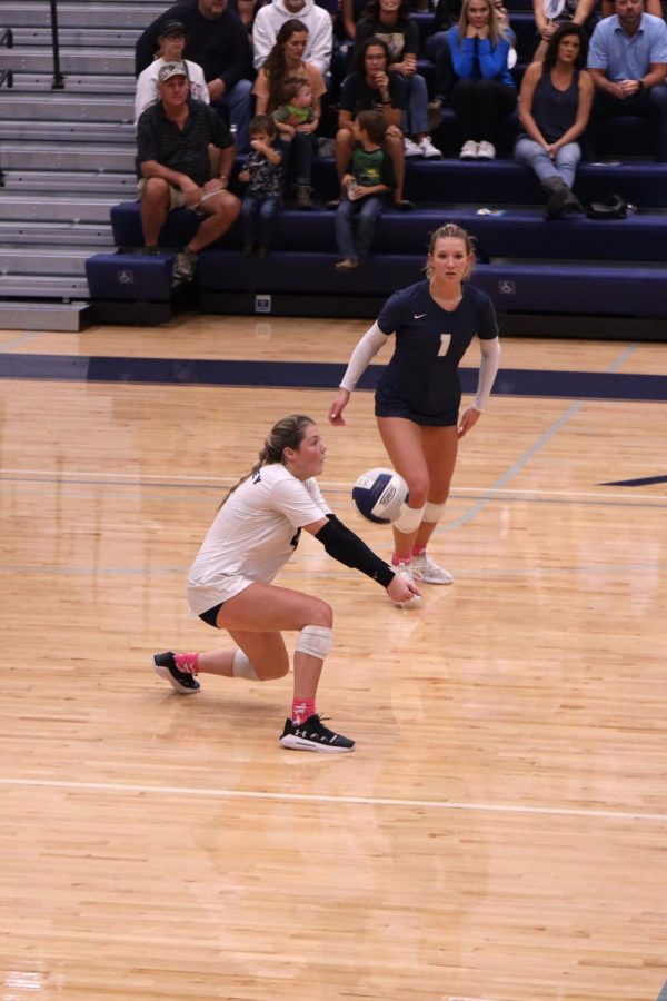 Arms forward, senior Sidney Kacsir receives a ball to pass to her setter.