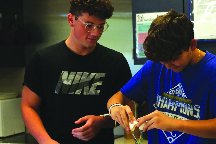 Ready to start, juniors Corbin Garnand and Ethan Brownfield begin baking brownies.