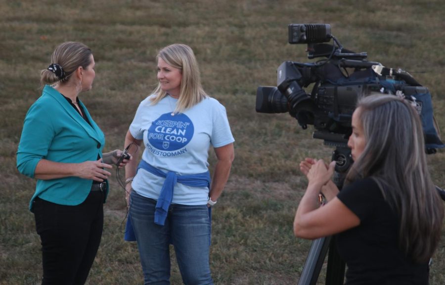 Libby Davis speaks with a reporter at the drug awareness event for her late son Cooper Davis.
