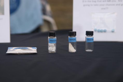 A display of lethal doses of drugs compared to lethal doses of fentanyl at the Keepin Clean for Coop drug awareness event.