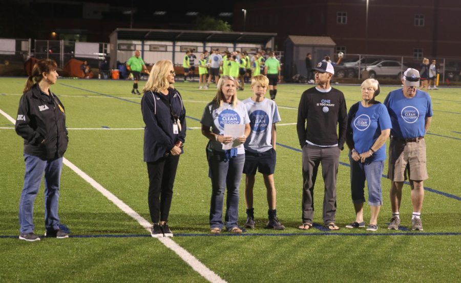 Standing in front of the crowd, Libby Davis speaks about drug awareness among teens.