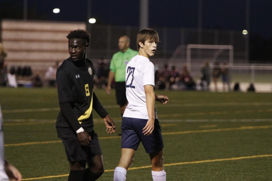 Sophomore Brady Robins walks back approaching half time. 