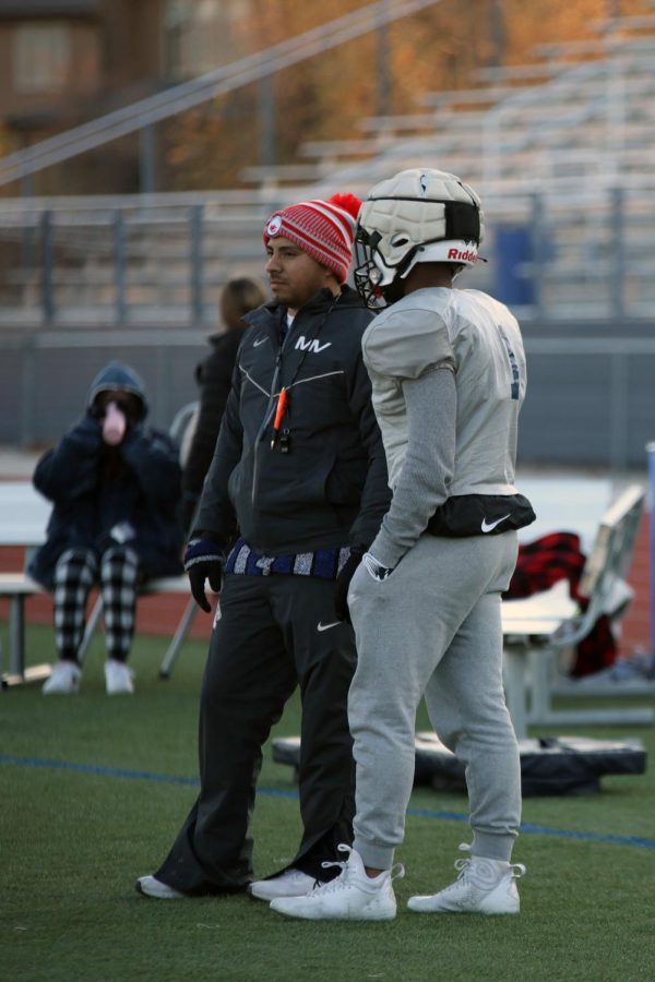 Talking to an offensive play is Coach Cruz Gallegos on Wednesday, Nov. 16. 