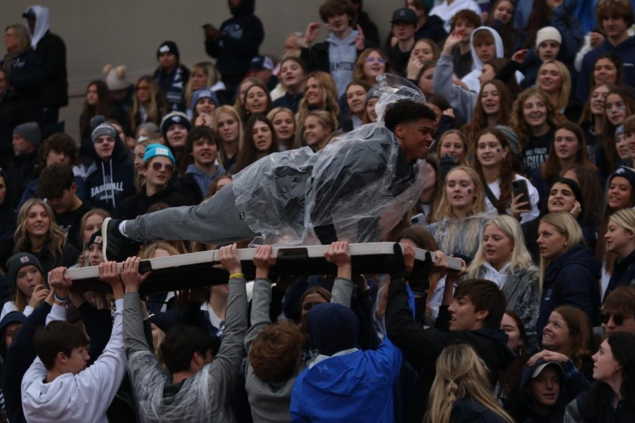 Senior Jameson Fisher does pushups celebrating a Jags touchdown.