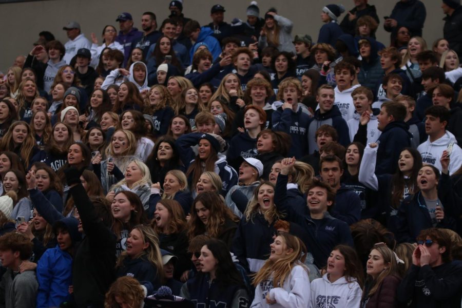 With high hopes, the student section partakes in chants.