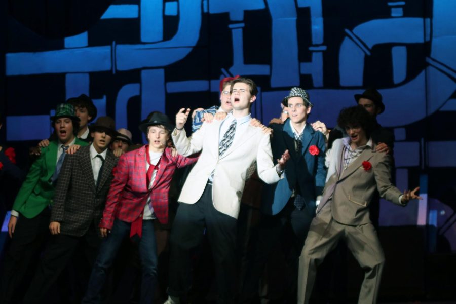 Acting as Sky Masterson, senior Atticus O’Brien sings “Luck be a Lady”. 

