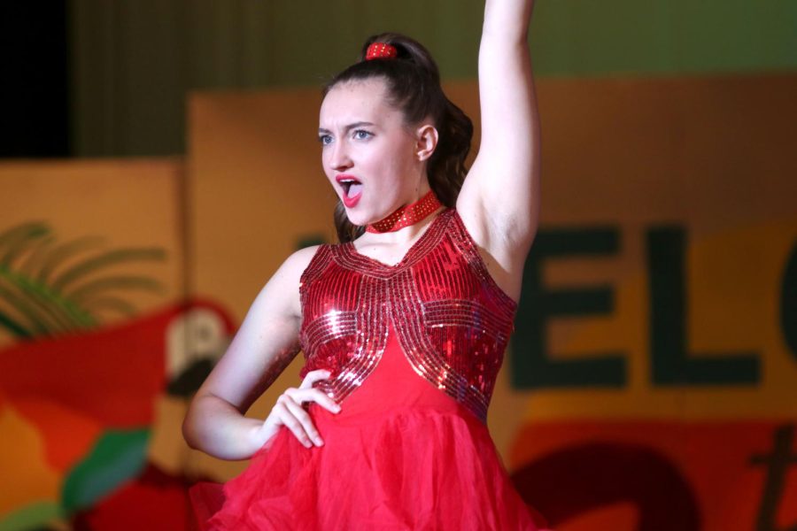 With her hand on her hip, sophomore Allyson Makalous performs a dance. 