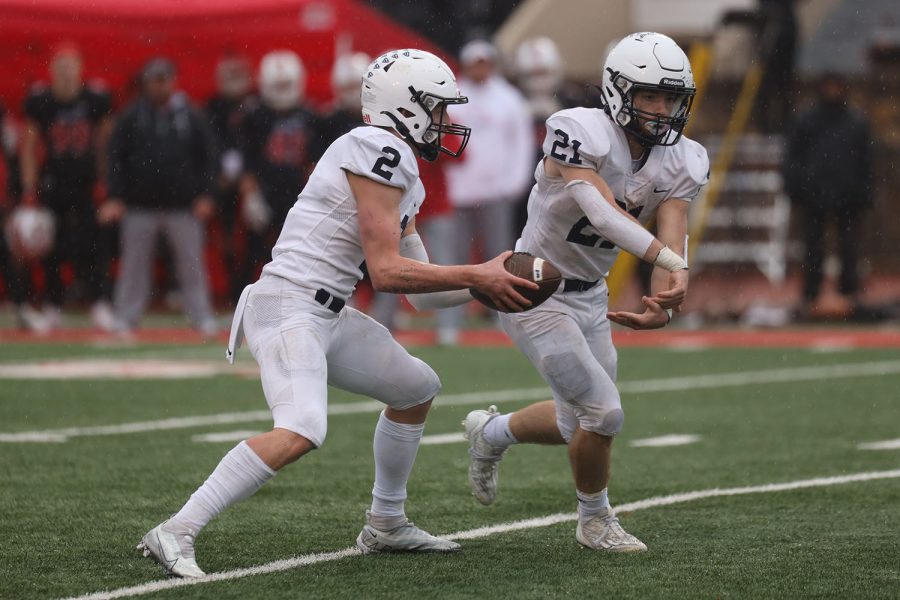 Junior Tristan Baker prepares to grab the ball from senior Hayden Jay.