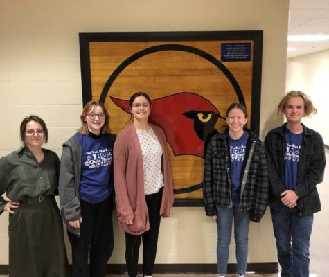 Standing in front of the Eudora High School mascot, Quiz Bowl members senior Madison Koester and juniors Anna Zwahlen, Emma Clement, Olivia Peters and Evan Mack pose for a picture.