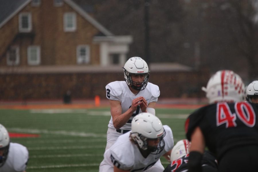 Senior Hayden Jay gets ready to receive the snap.