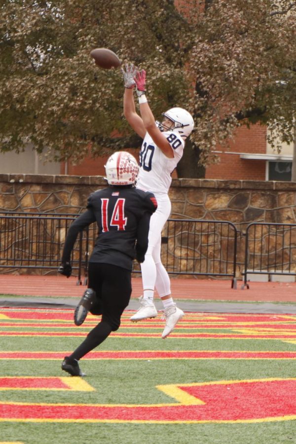 Getting up to make a reception, sophomore Brody Brigham secures a touchdown pass in the first quarter. The TD would later be called back after a holding call on the offense.
