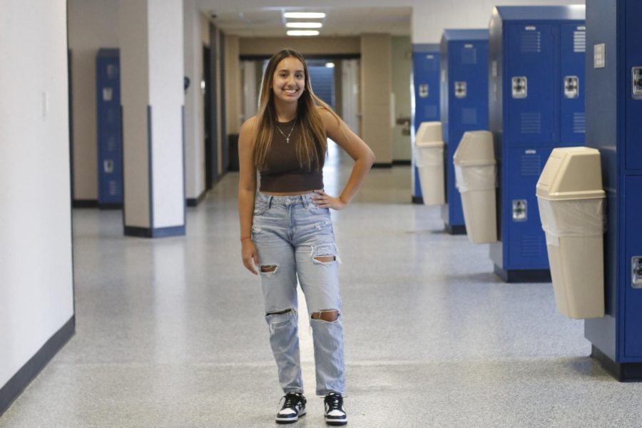 Standing in her highwaisted jeans, Junior Brianna Guerrero smiles for the camera on Wednesday, October 19.