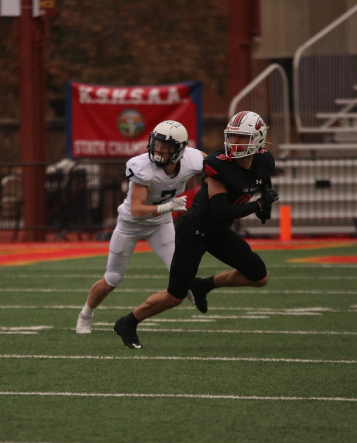 Senior Mikey Bergeron chases the opponent. 