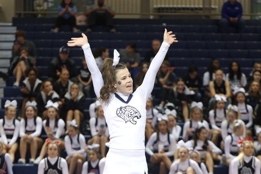 Looking to her right, freshman Kyndal Geis spirits to the crowd.