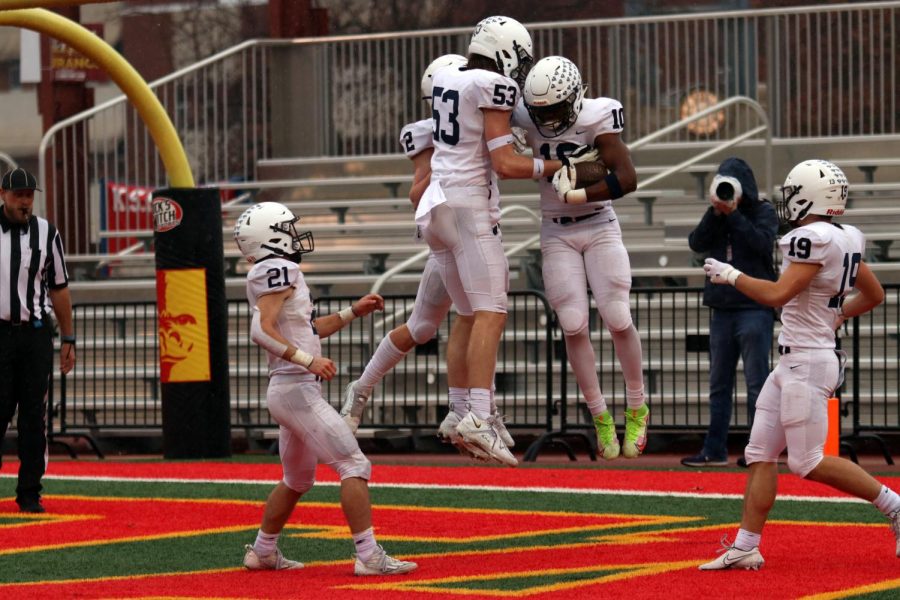 Juniors Mason Kemp and Davion Harris celebrate after a Harris caught a touchdown pass from quarterback Hayden Jay.