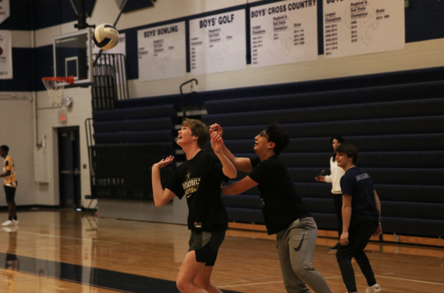 Sophomore Carter Kaifes and junior Jude Middleton go for the volleyball in Team Sports. 