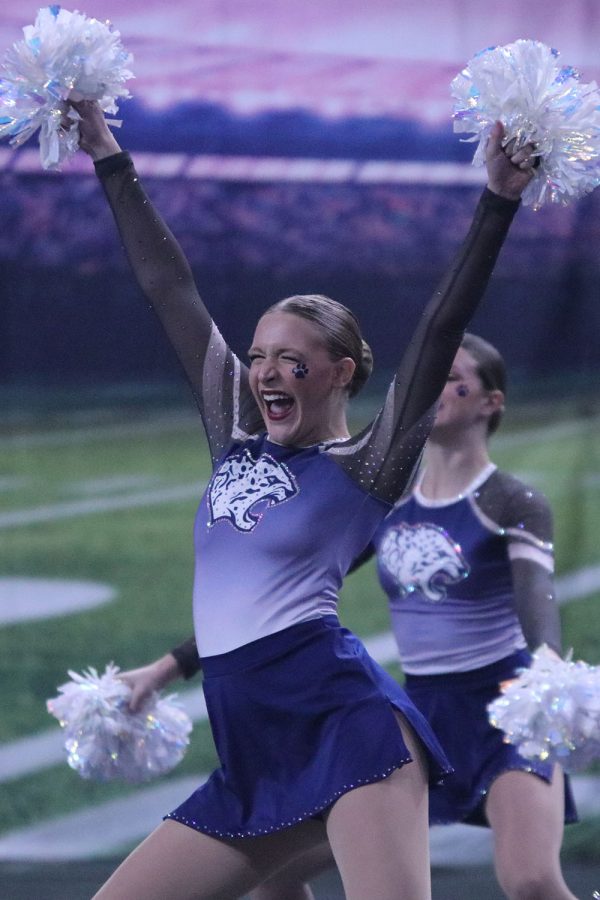 Hip popped and hands in the air, sophomore Ashley Ayers soaks up every second of her final performance of the day.
