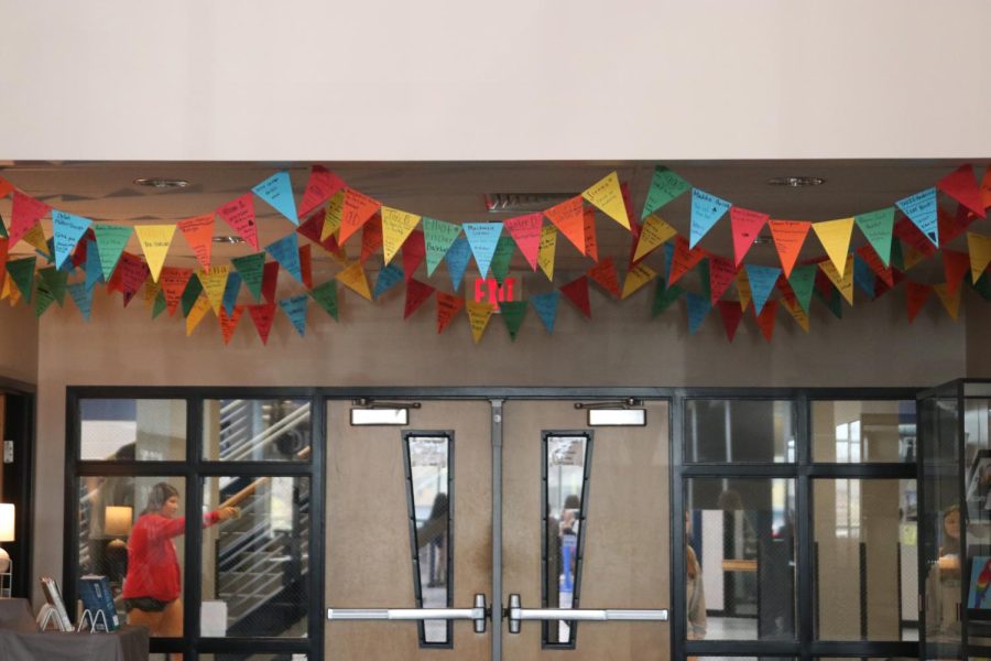 Librarian Ashley Agre continues her freshman banner tradition. 