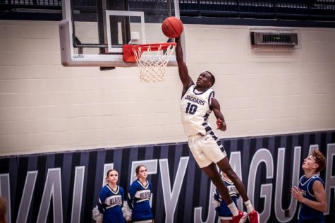 Senior Nen Matlock dunks the ball leaving Gardener 15 points behind. 