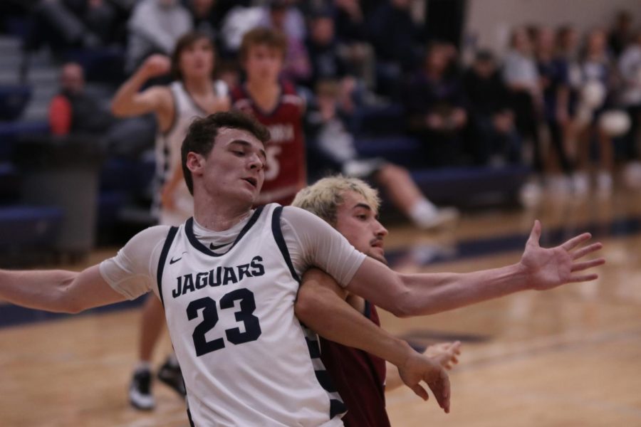 Senior Ryan Cummings blocks his opponent to make an opportunity for the Jaguars to score against Eudora.