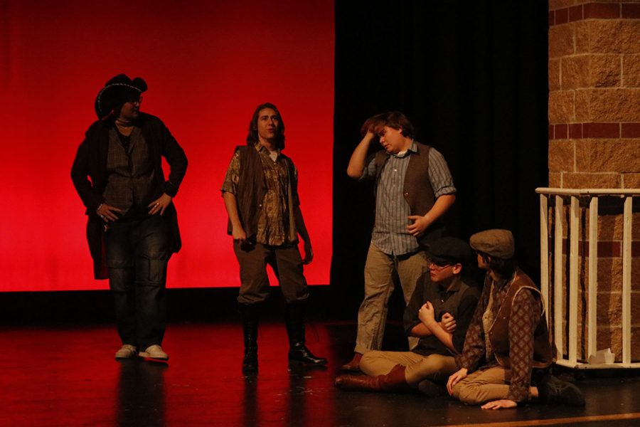 Orphans Peter, played by senior Luke O’Neal, and his friends are confronted by pirates, played by junior Nathan Garner and senior Jameson Beran, after escaping their previous capture Tuesday, Dec. 6. 