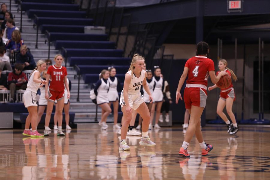 Senior Sophie Pringle defends against the ball carrier.