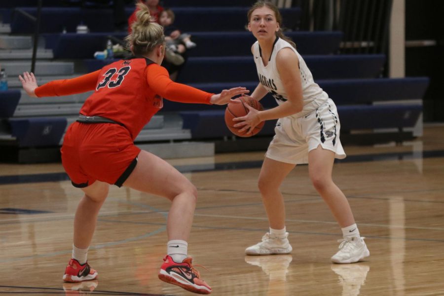 Strategizing her next play, sophomore Gracie Kurzejeski looks to her teammates. 
