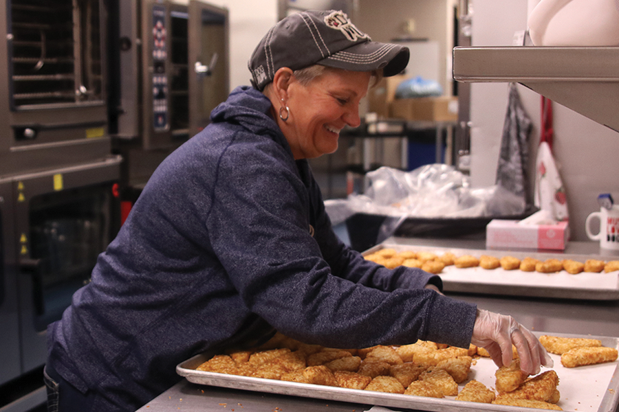 Head lunch lady Michelle Kile prepares for the days lunch Thursday, Jan. 26