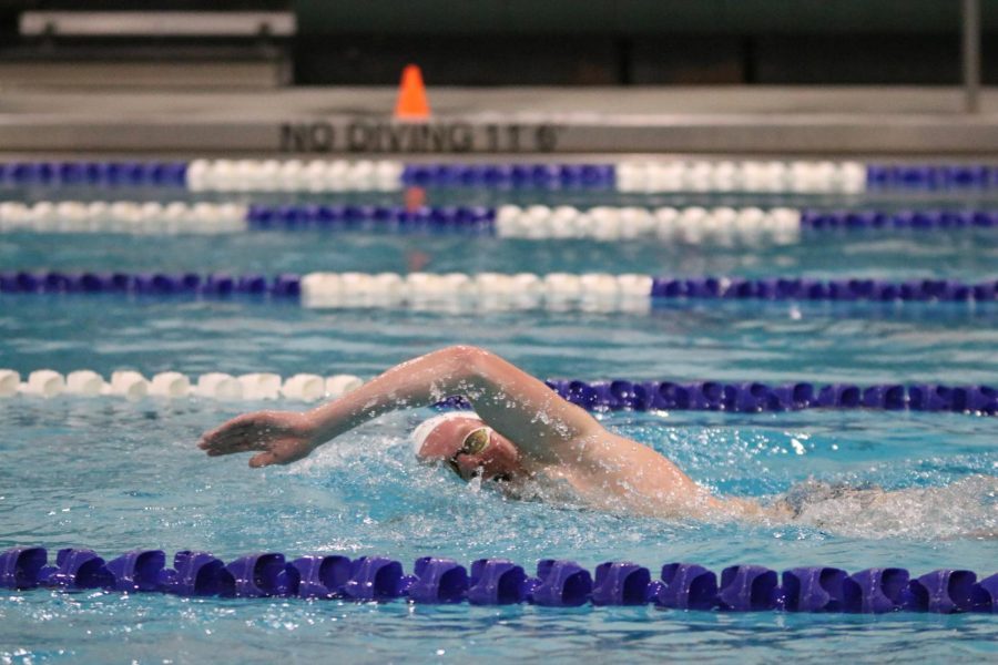 Senior Anthony Molinaro works to keep a steady pace during the 500m