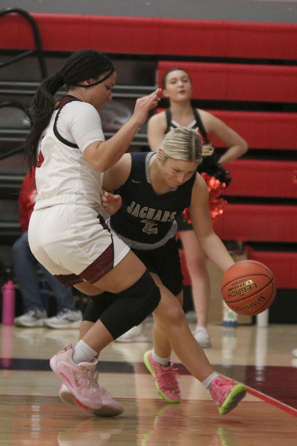 Driving hard, junior Keira Franken tries to get to the basket. 

