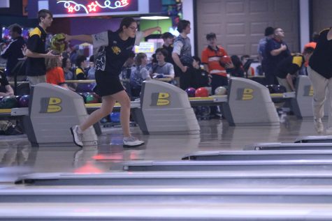 Ready to bowl, junior Kiara Gonzalez keeps her eyes on the pins. 