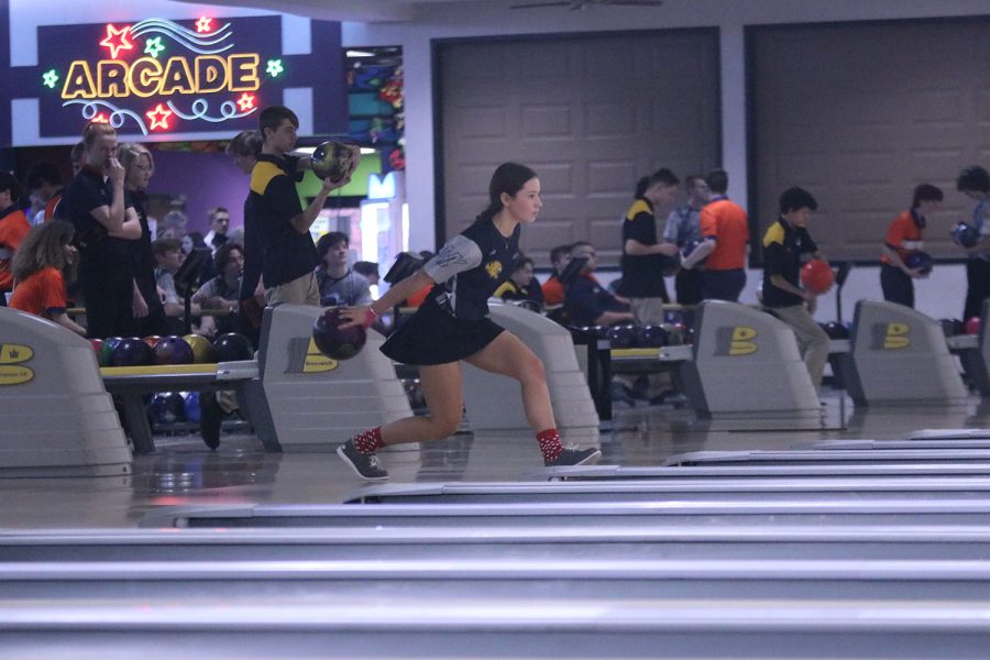 About to release the ball, senior Eden Hakes focuses on the pins she needs to hit. 
