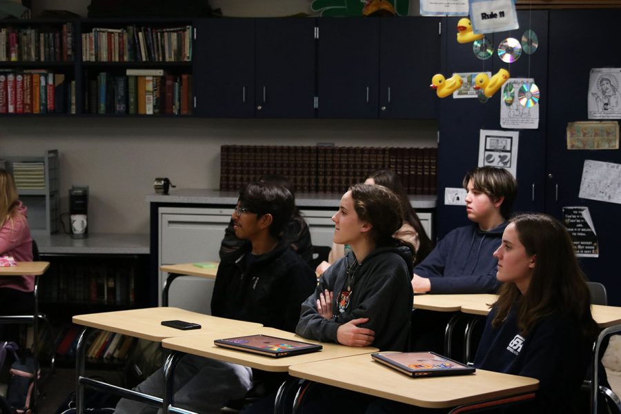 Sophomores Shubh Patel, Bella Guess and Luci Guess show interest in joining Model UN by actively listening to the information being presented to them Tuesday, Jan. 10. 