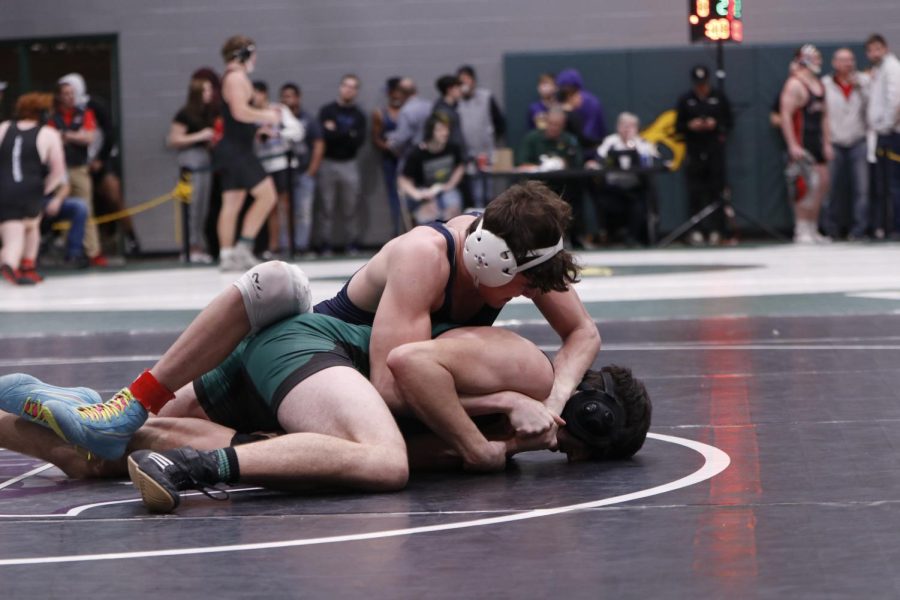 Senior Dylan Massey takes his opponent down with a few seconds left on the clock. 