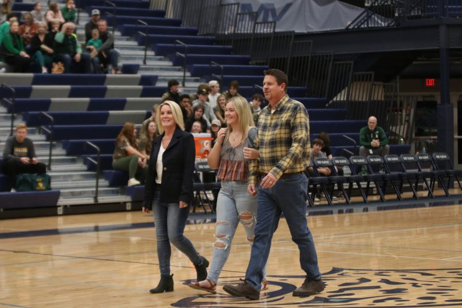 Smiling, senior Sophia Rosetti is recognized as a boys basketball manager.